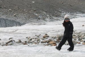 3 year old Kyra dances across the glacier